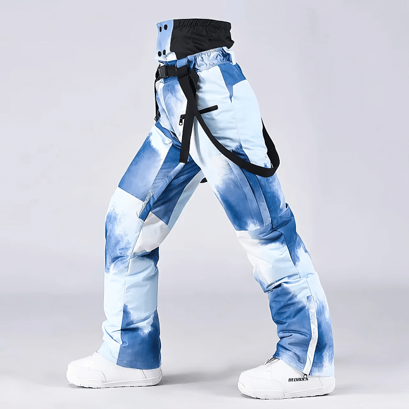 Windproof warm big ski trousers with suspenders in blue, ideal for skiing and snowboarding, made from cotton and polyester blend for comfort.